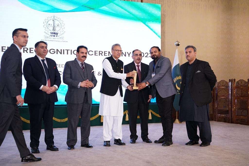 The Excellence Achievement Shield being presented on stage beneath the LCCI 'Achievement Recognition Ceremony 2023' banner.