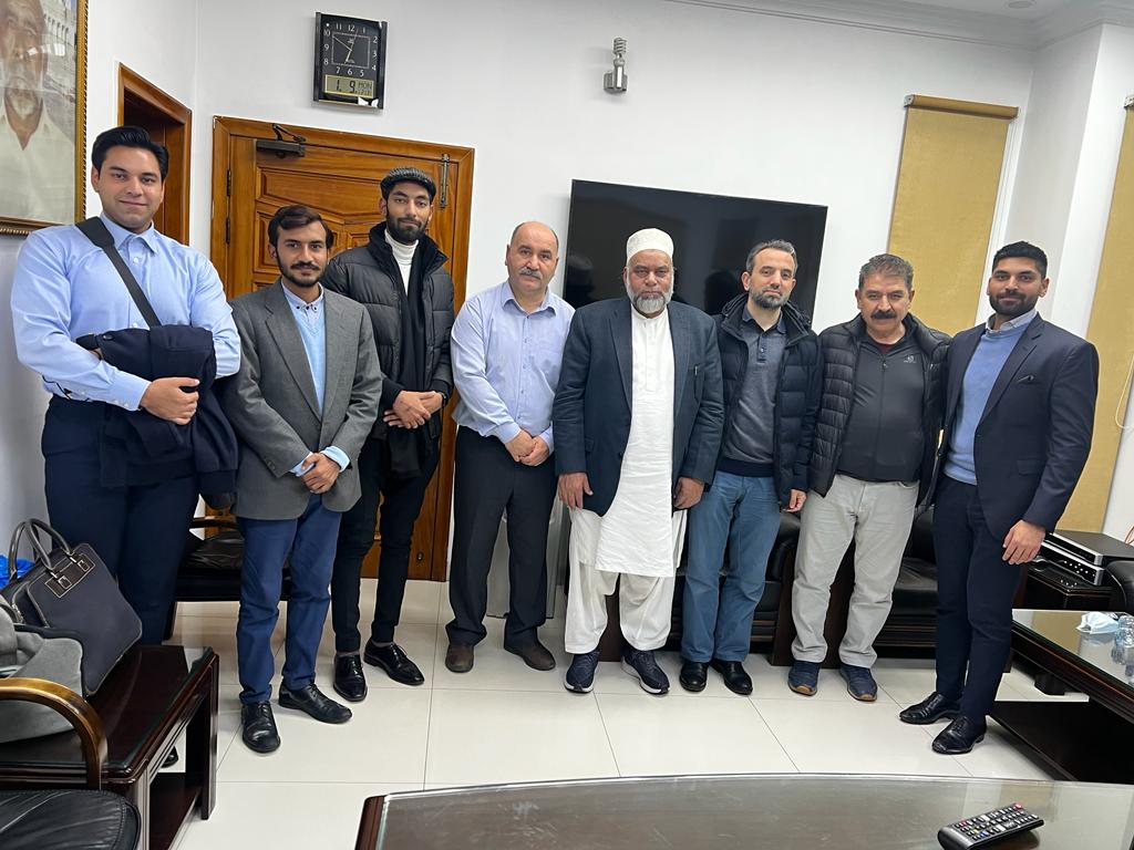 The Sadiq Gelatin Industries team with the three visiting TSE inspectors in a meeting room.